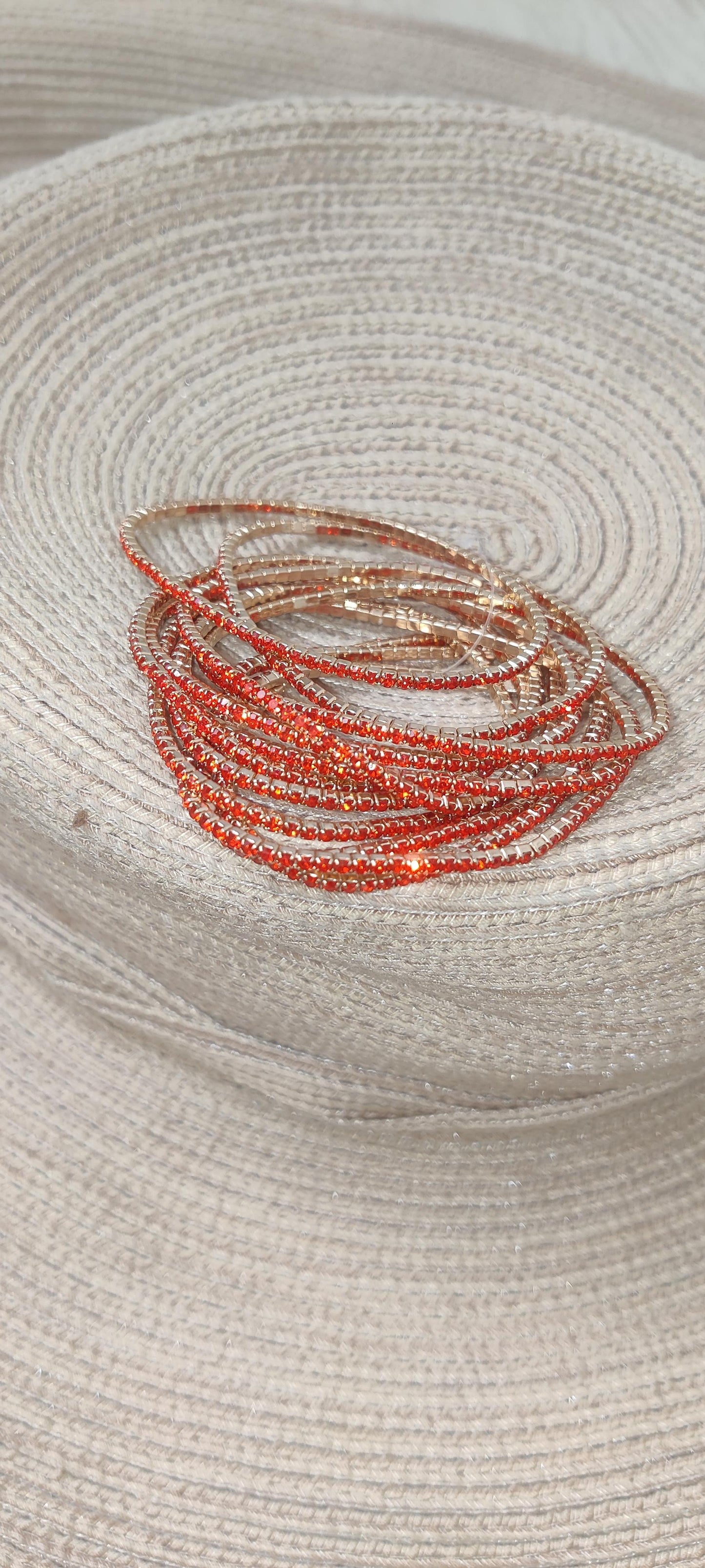 Pulsera Elástica de Acero Dorado y Cristales Naranja Brillante