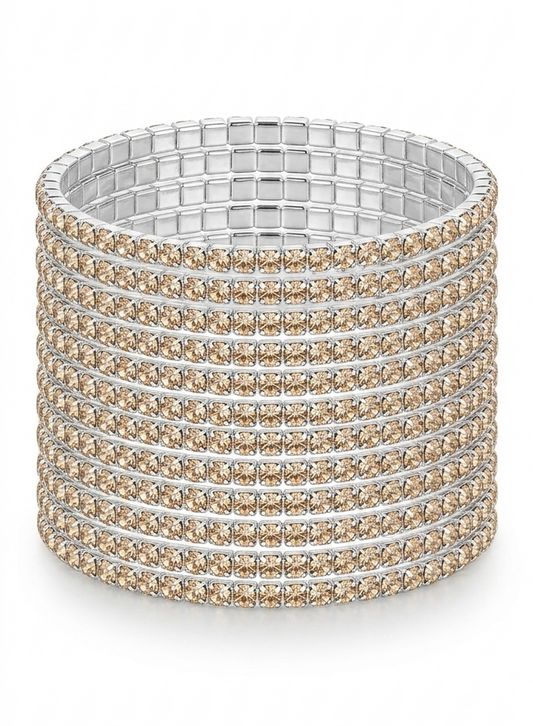 Pulsera elástica de acero plateado con cristales beige