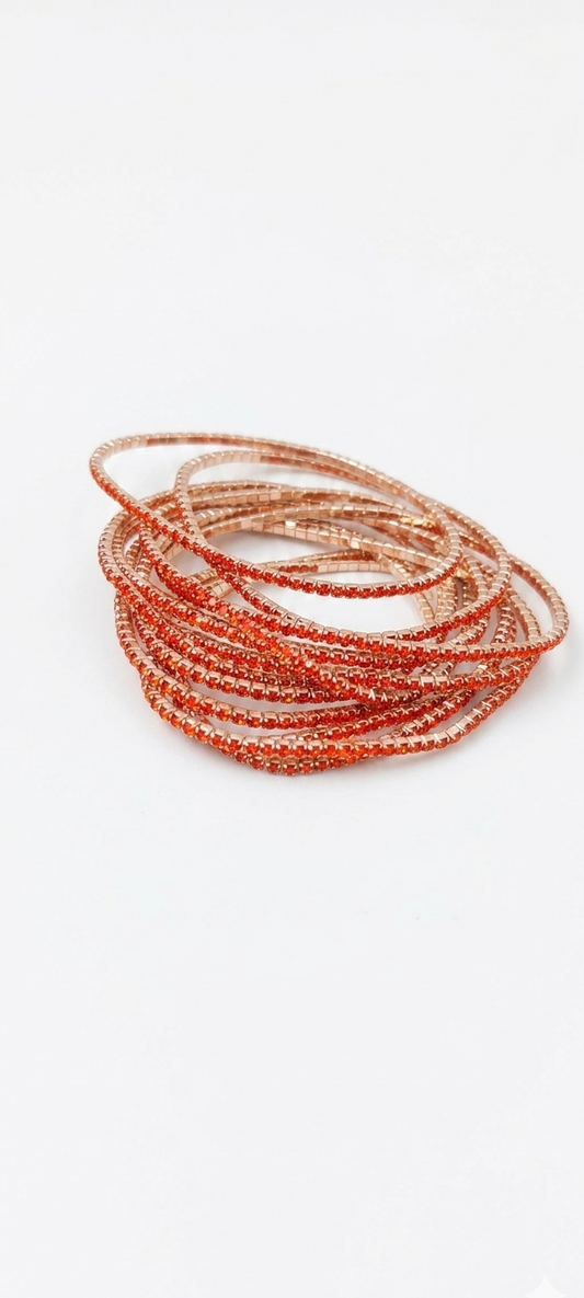 Pulsera Elástica de Acero Dorado y Cristales Naranja Brillante